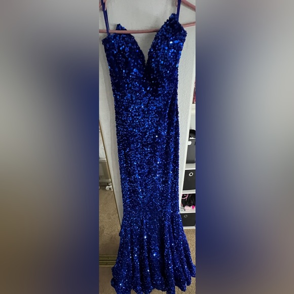 Im selling this prom dress from lady black tie!It’s a size 0 and darkroyal blue. - Picture 2 of 4
